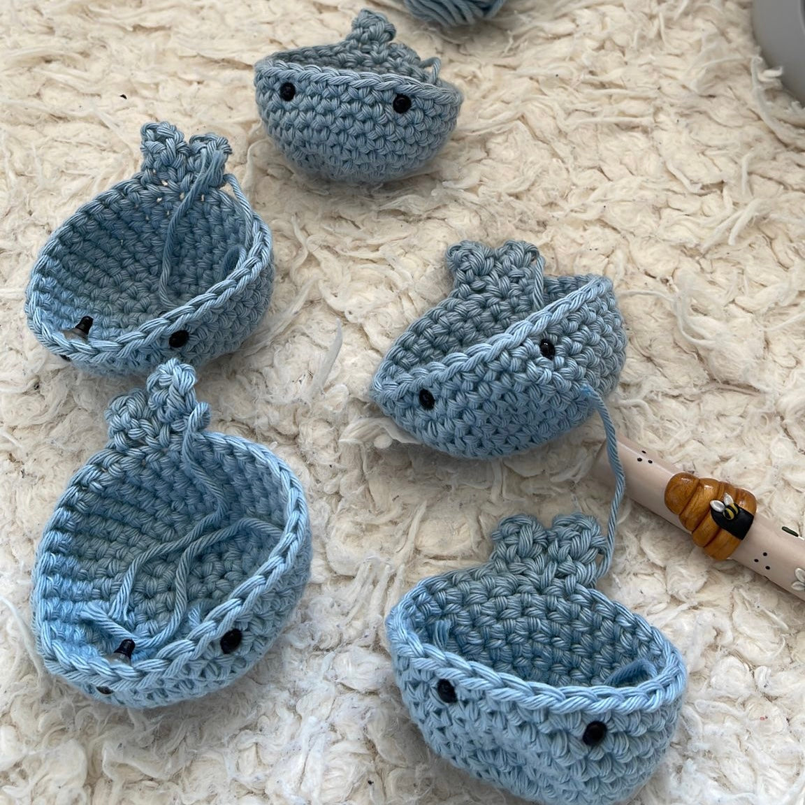 Crochet Worry Whale image, emotional wellness plushie, handcrafted fidget friend, fidget companion whale, cute worry plush animal, worry animal in blue lilac green, stress relief crochet animal, mindfulness support plush whale, soft tactile whale charm, whale plush friend for adults, lilac whale crochet keychain, green whale anxiety plush, whale emotional aid toy, calming plush ocean creature, hand-knit whale fidget plush, mini whale plush for stress, whale sensory support item, adult-friendly fidget whale